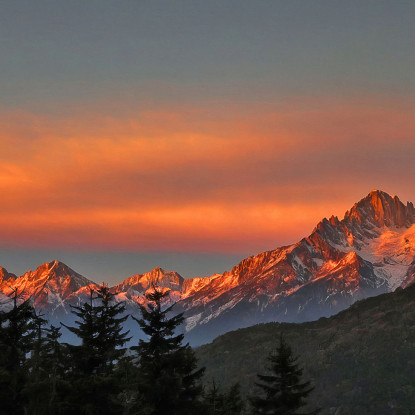 Quadro Montagne Tramonto Infuocato Sulle Cime Delle Montagne Innevate mow8 quadro stampato su tela